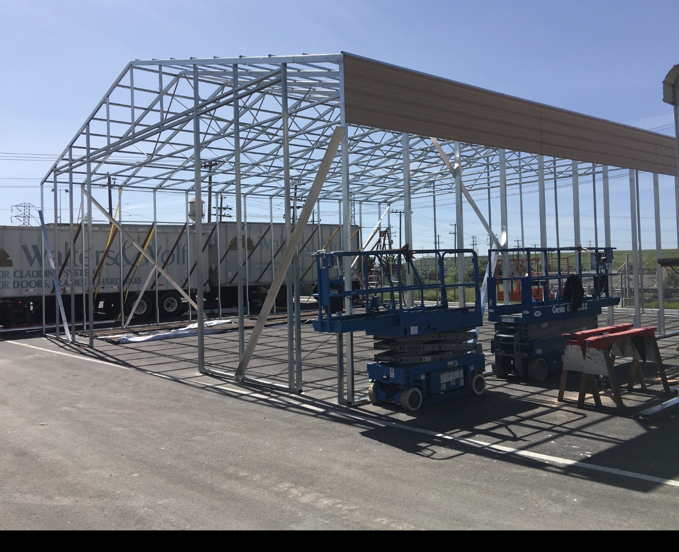 Steel structure during frame erection on a commercial-scale specialty build